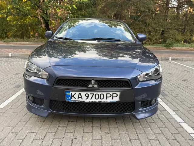 Mitsubishi Lancer - фото 1
