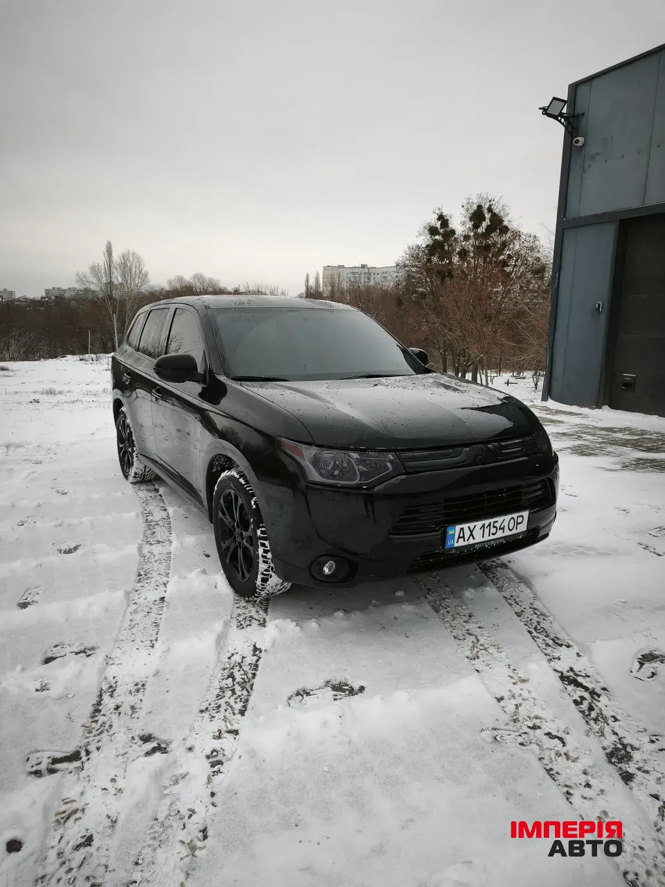 Mitsubishi Outlander - фото 1