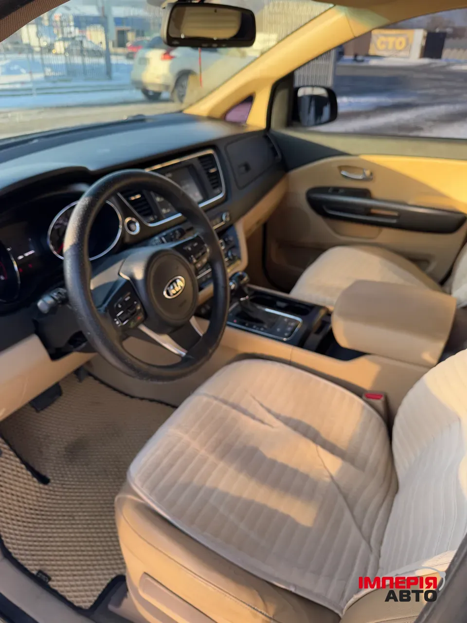 Kia Carnival - фото 8