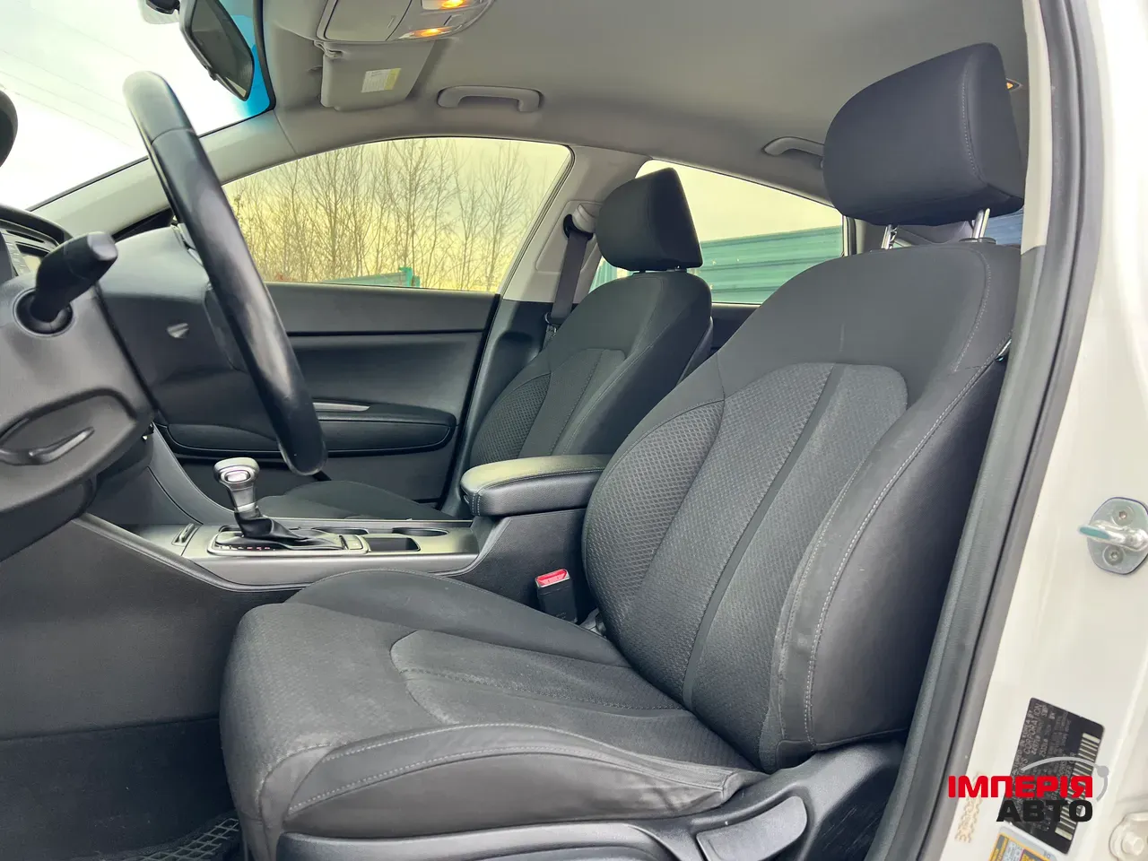 Kia Optima - фото 10