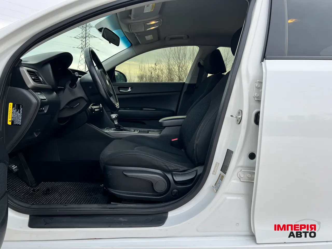 Kia Optima - фото 9