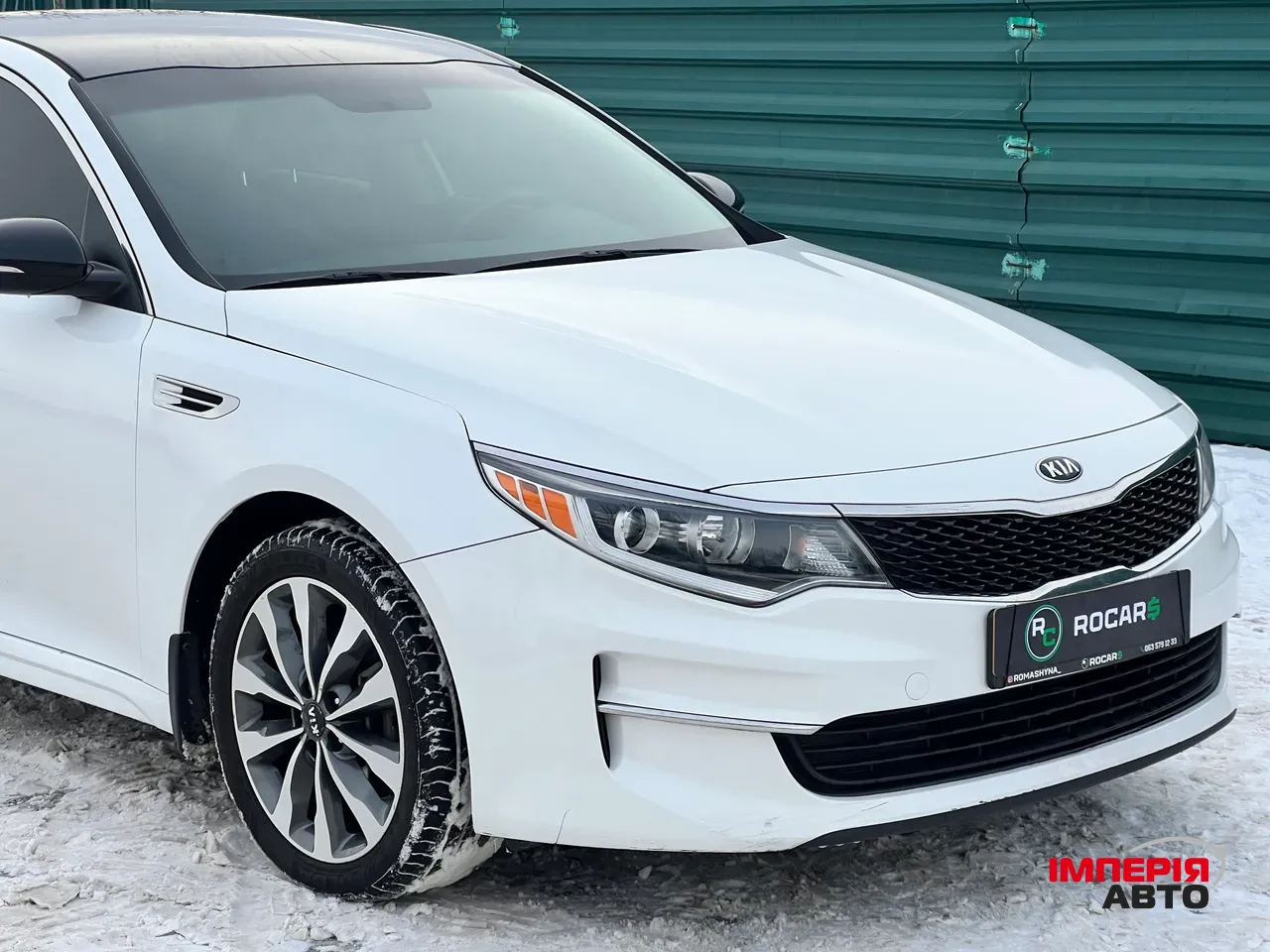 Kia Optima - фото 7