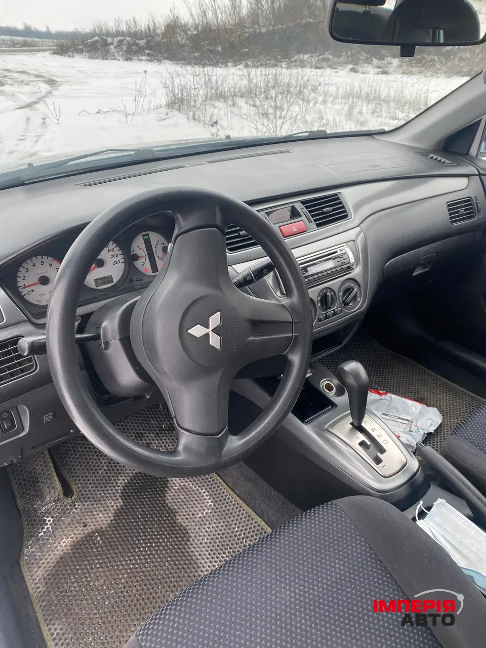 Mitsubishi Lancer - фото 11