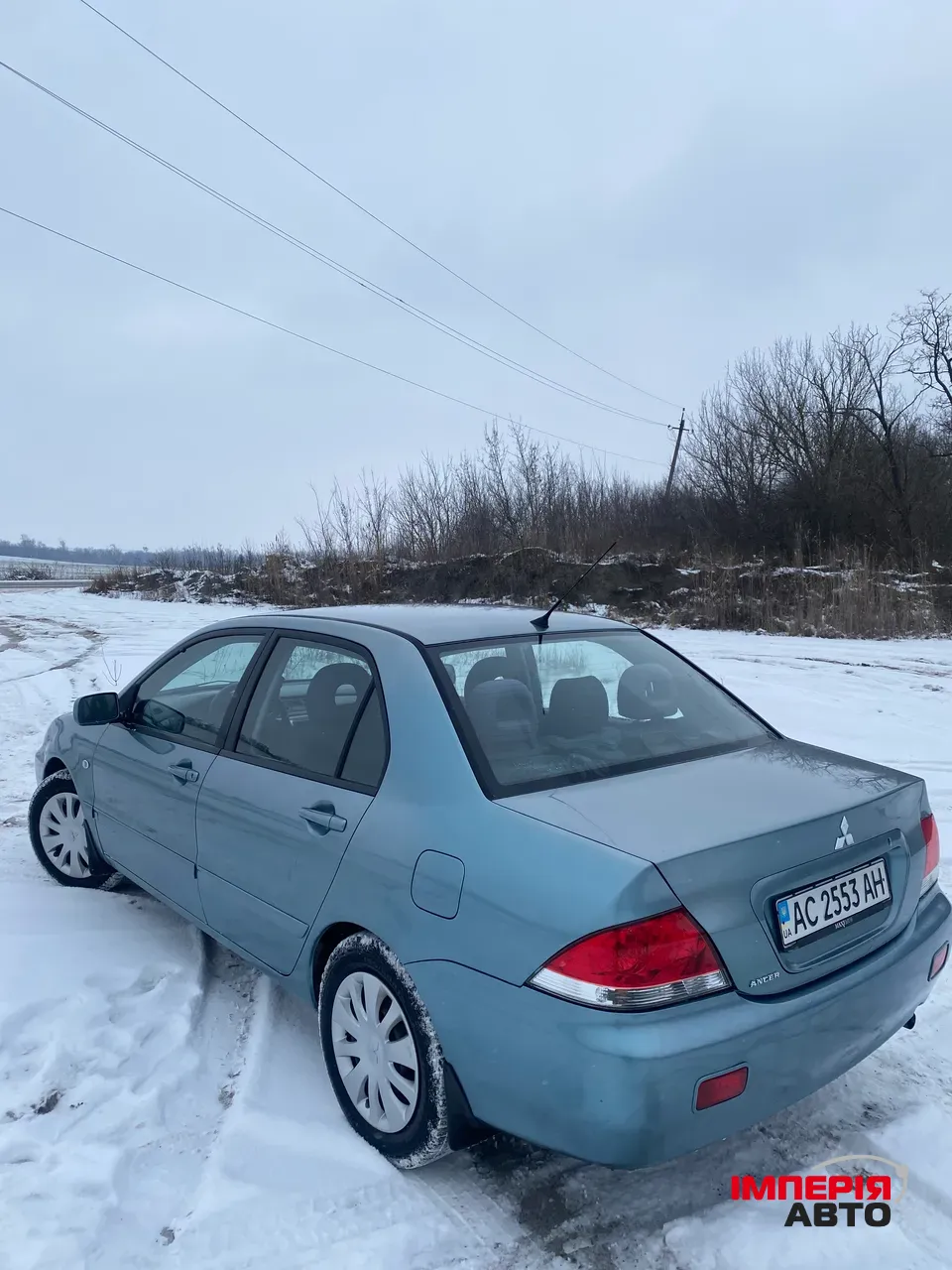 Mitsubishi Lancer - фото 6