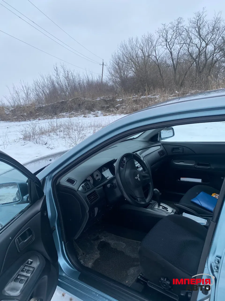 Mitsubishi Lancer - фото 12