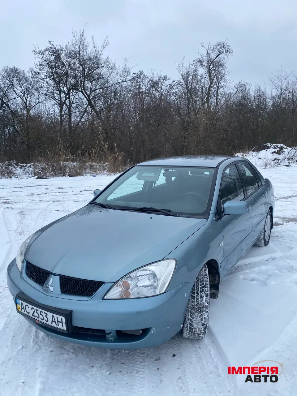 Mitsubishi Lancer - фото 1