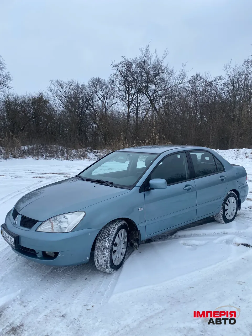 Mitsubishi Lancer - фото 3