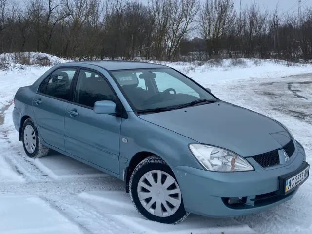 Mitsubishi Lancer - фото 4