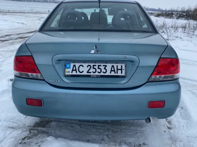 Mitsubishi Lancer - фото 5