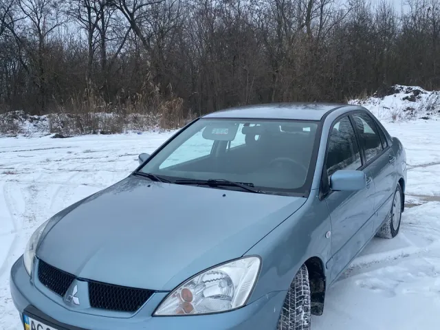 Mitsubishi Lancer - фото 1