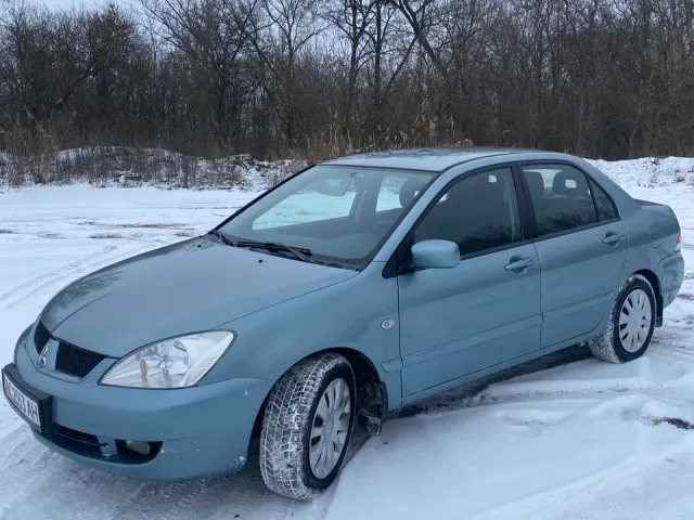 Mitsubishi Lancer - фото 3