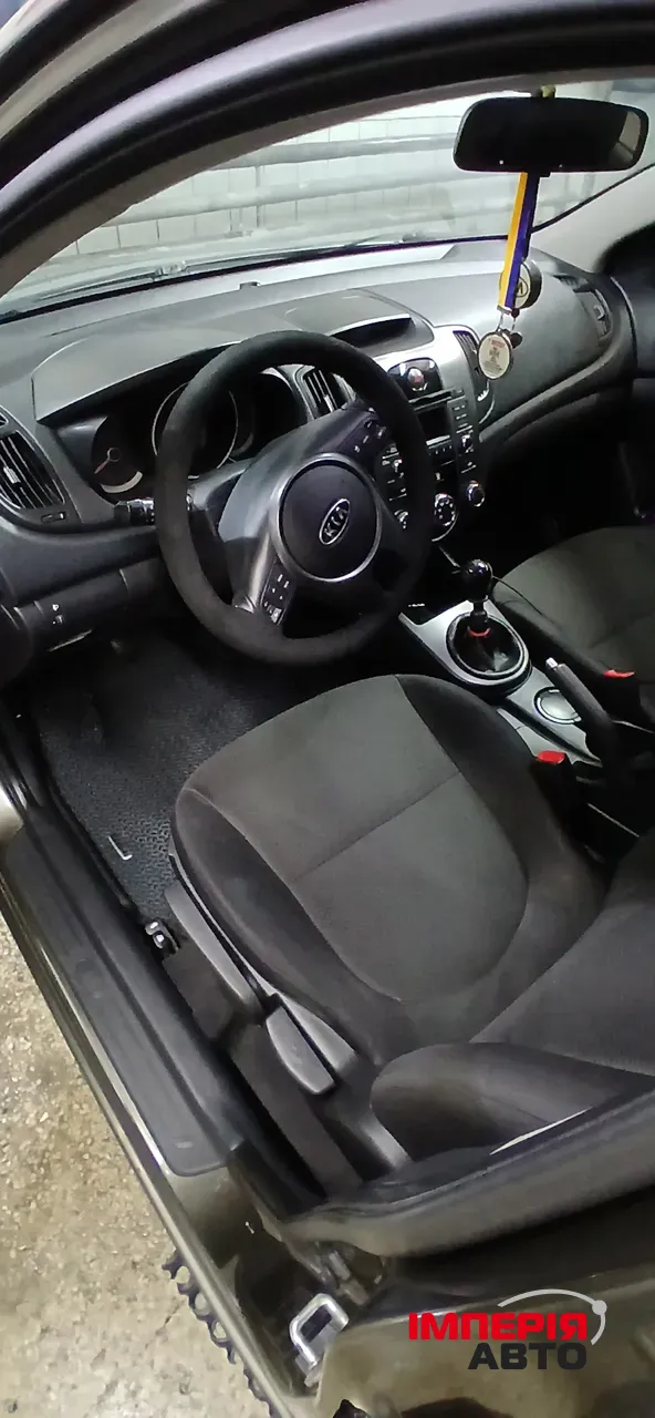 Kia Cerato - фото 11
