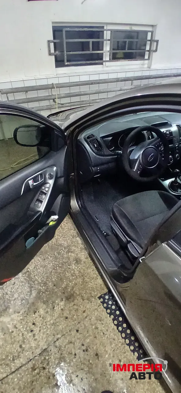 Kia Cerato - фото 9
