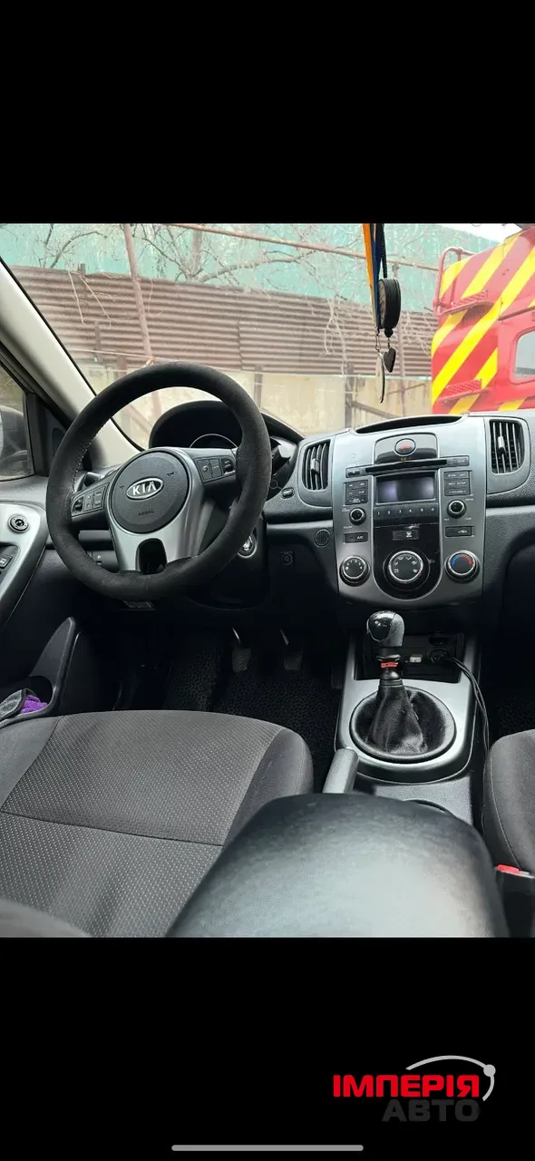 Kia Cerato - фото 8