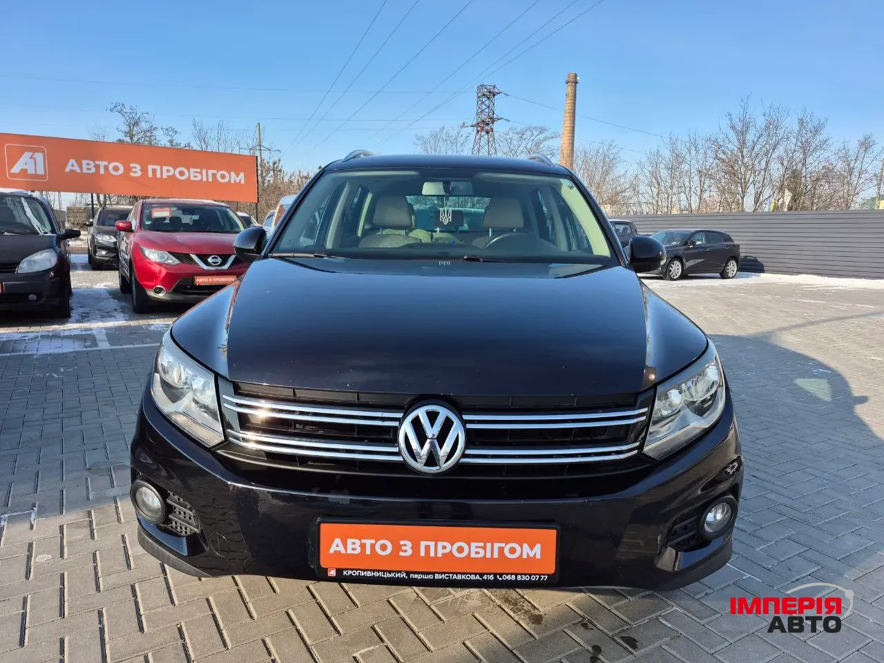 Volkswagen Tiguan - фото 2