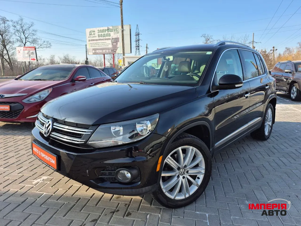Volkswagen Tiguan - фото 1