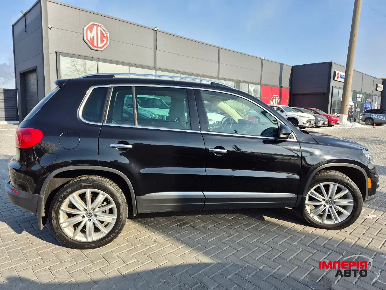 Volkswagen Tiguan - фото 4