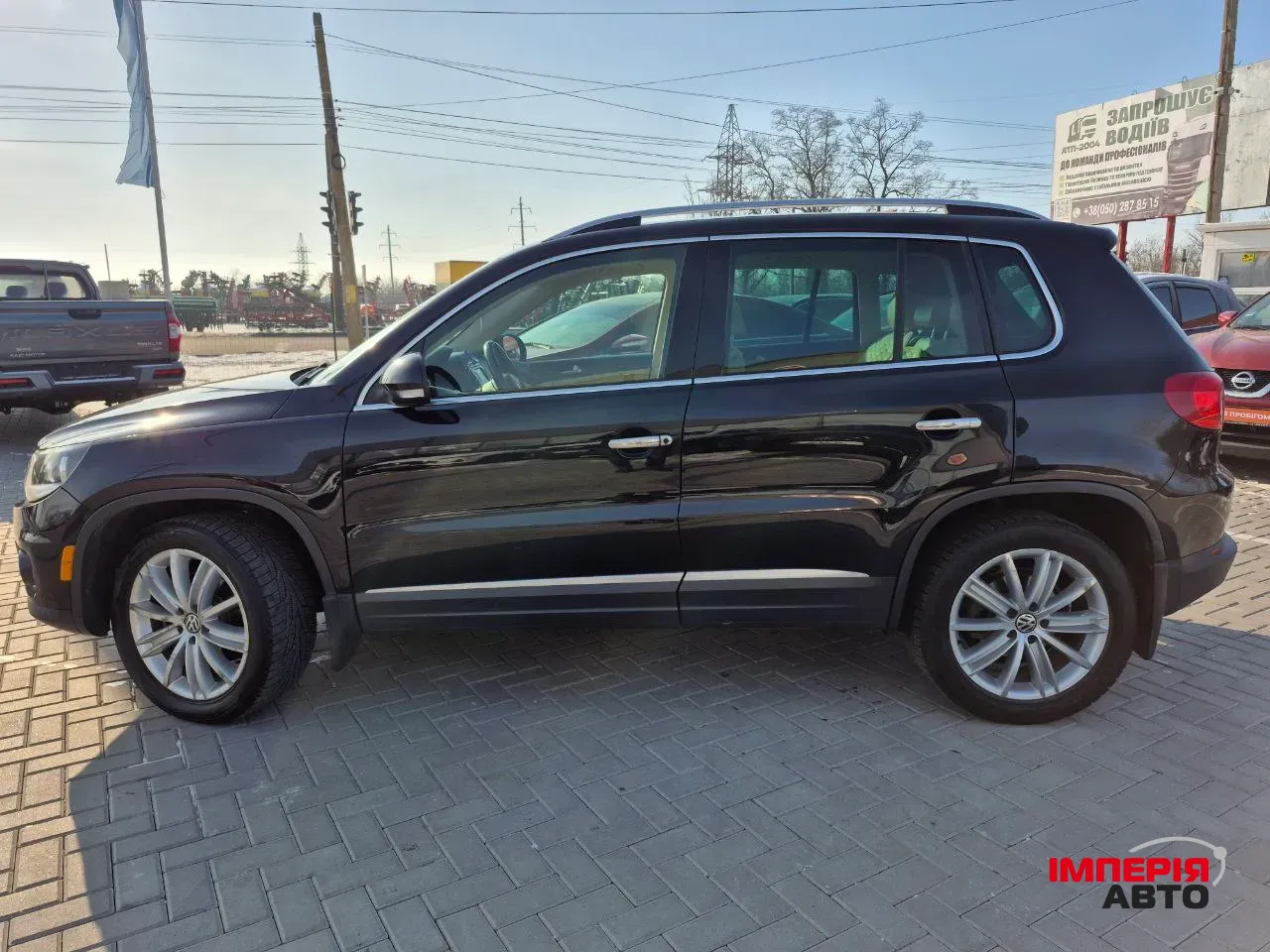 Volkswagen Tiguan - фото 8