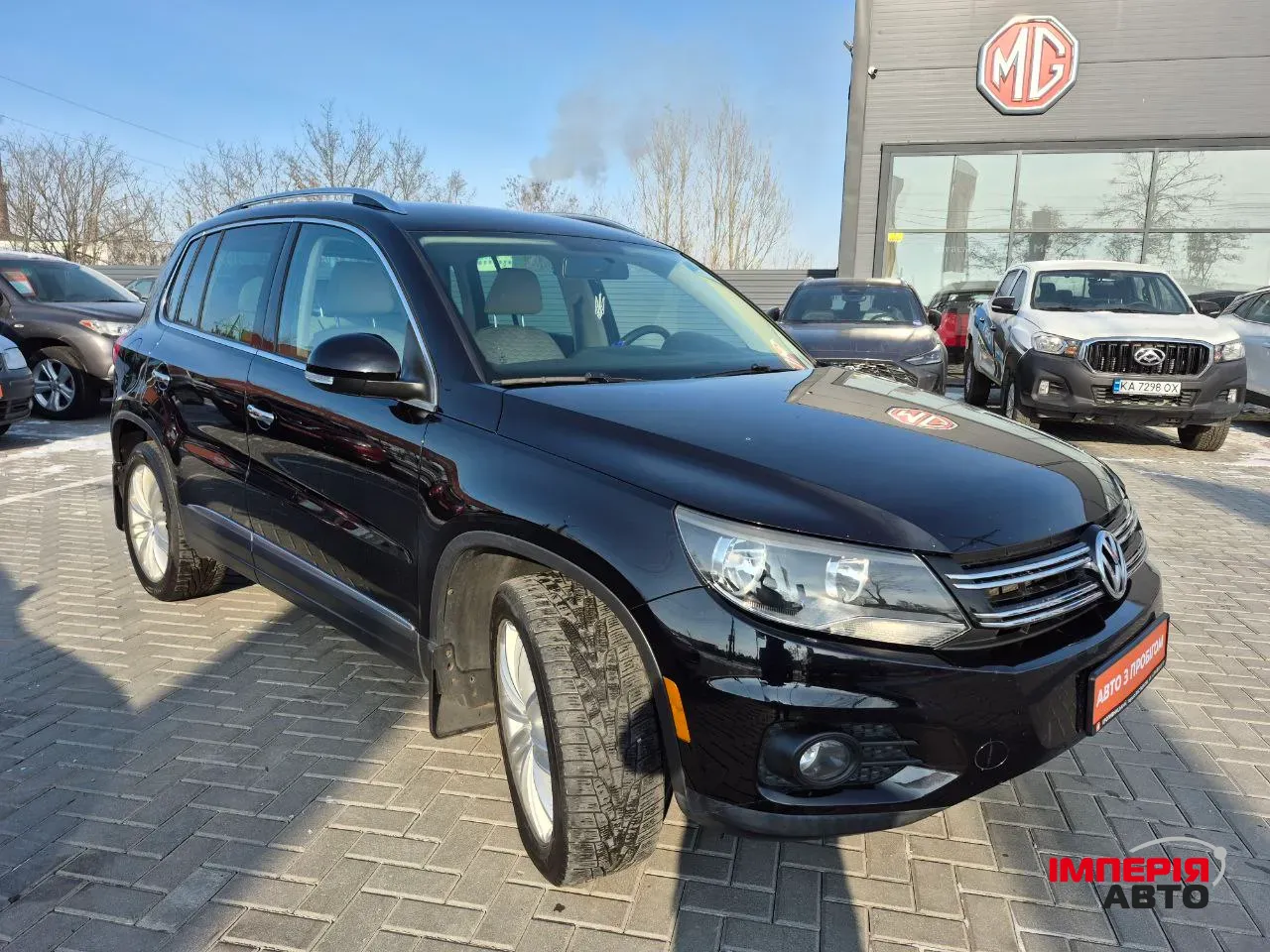 Volkswagen Tiguan - фото 3