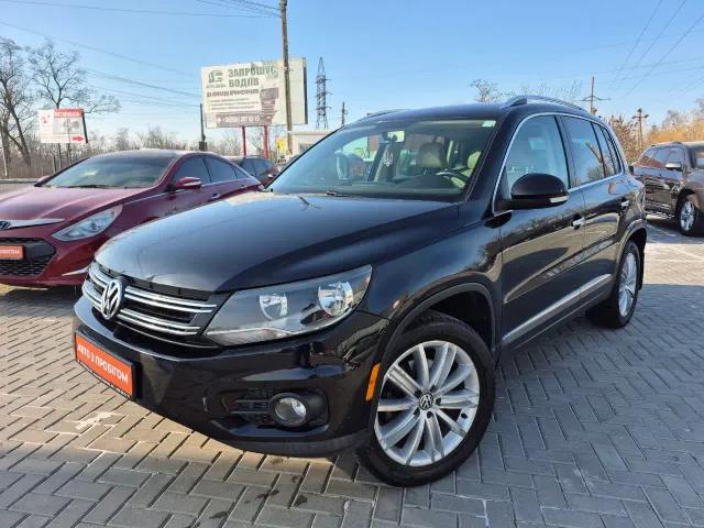 Volkswagen Tiguan - фото 1