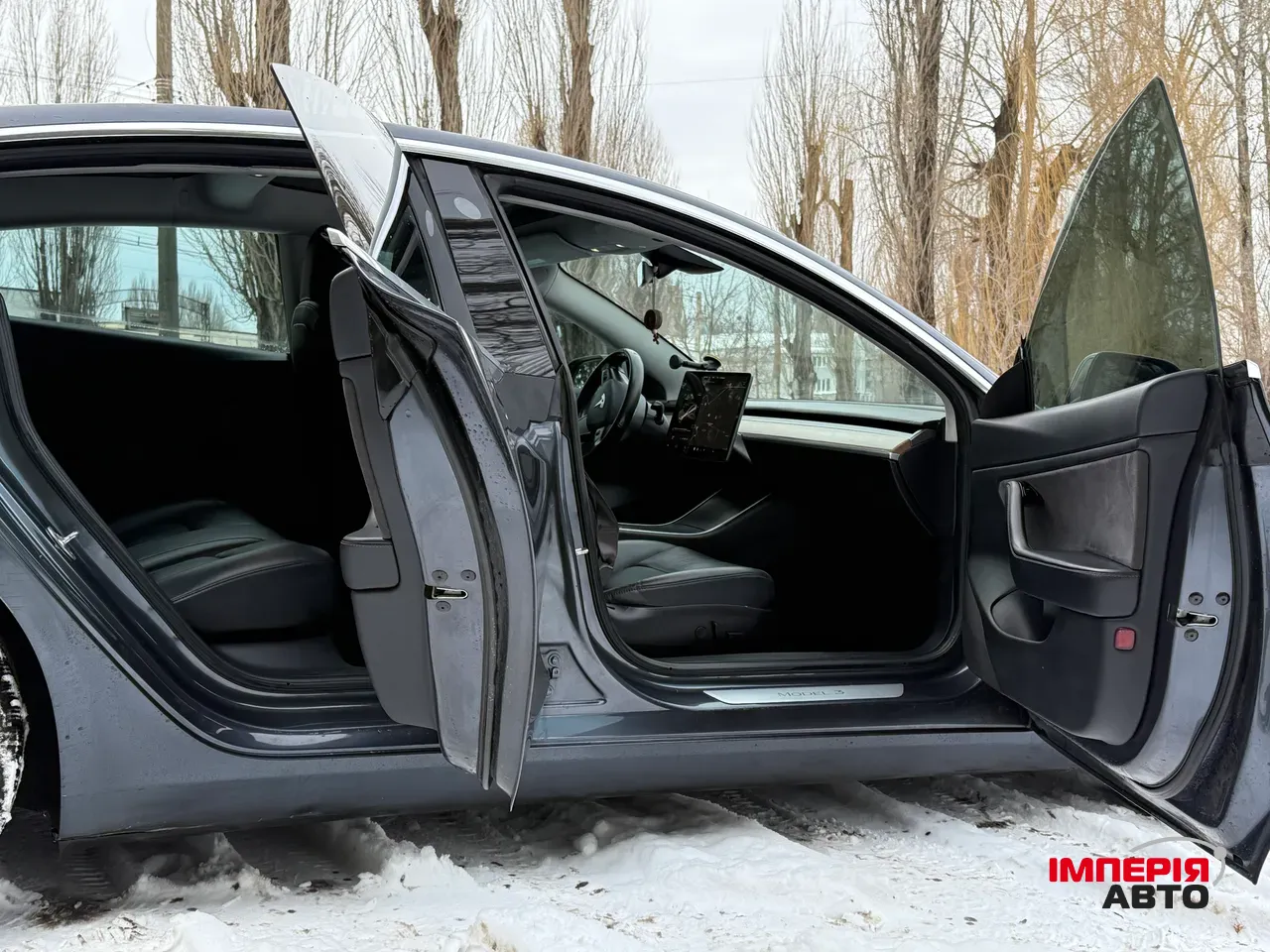 Tesla Model 3 - фото 7