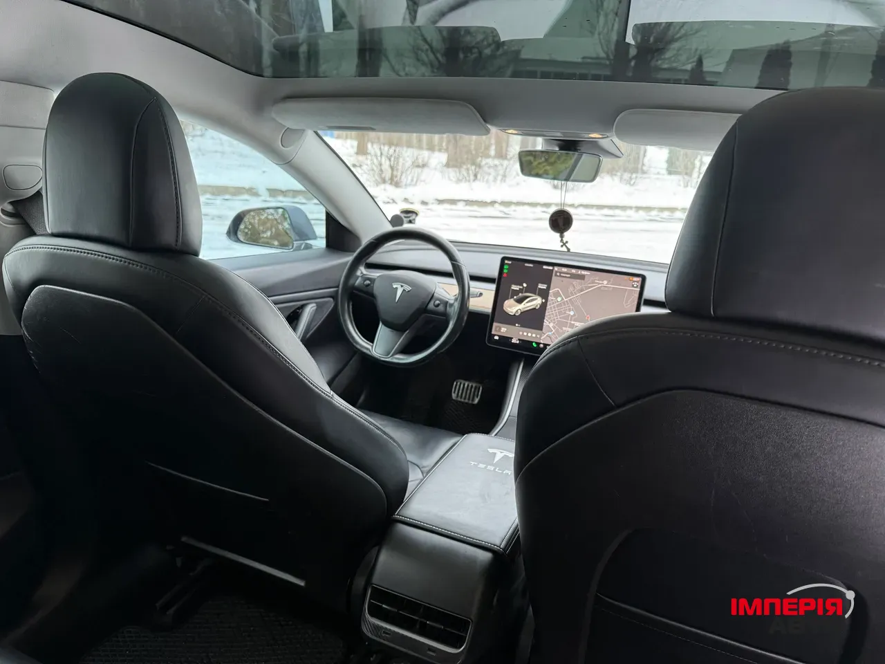 Tesla Model 3 - фото 13