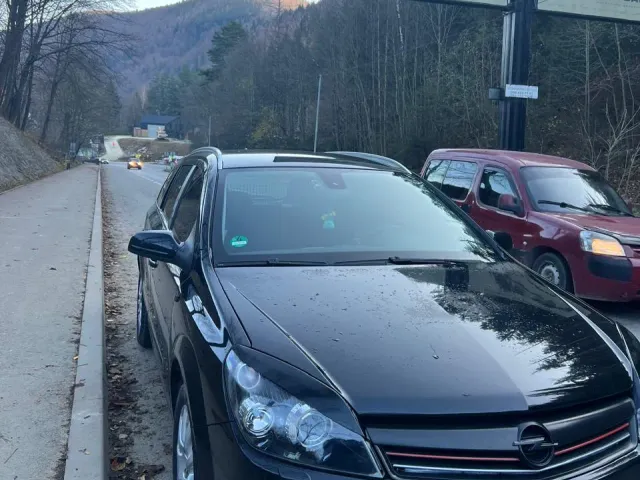 Opel Astra - фото 1