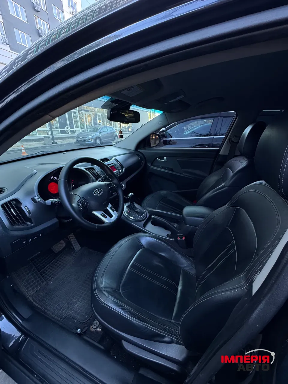 Kia Sportage - фото 11