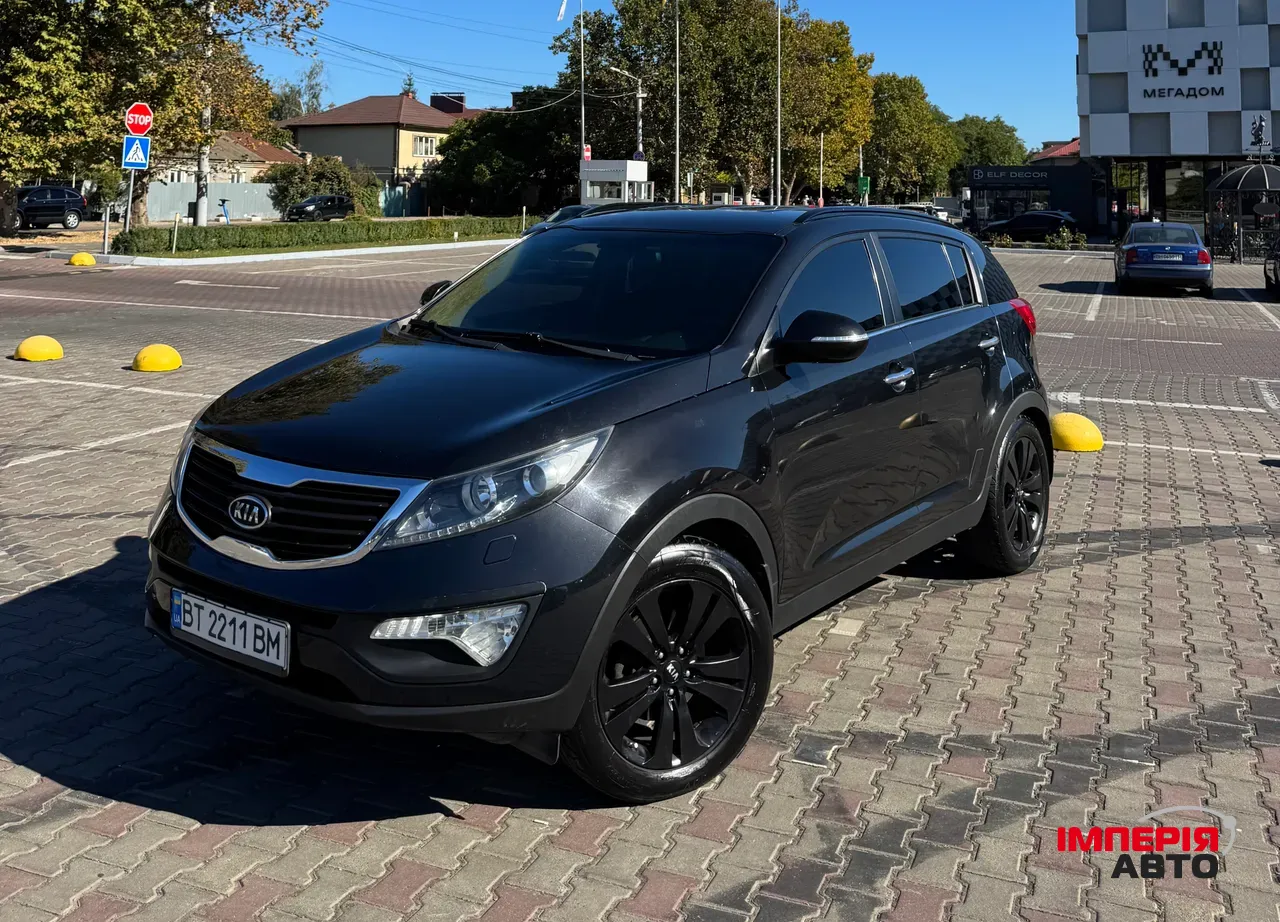 Kia Sportage - фото 1