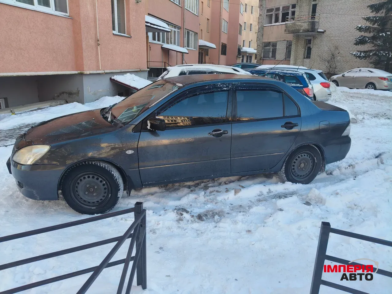 Mitsubishi Lancer - фото 3