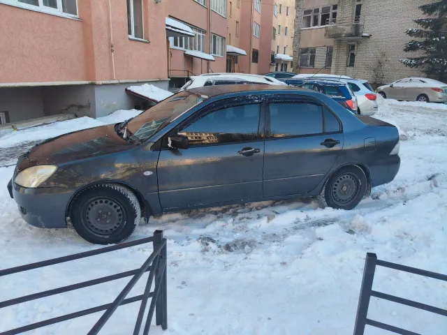 Mitsubishi Lancer - фото 3