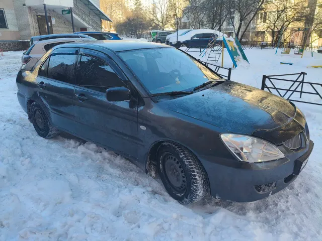 Mitsubishi Lancer - фото 1