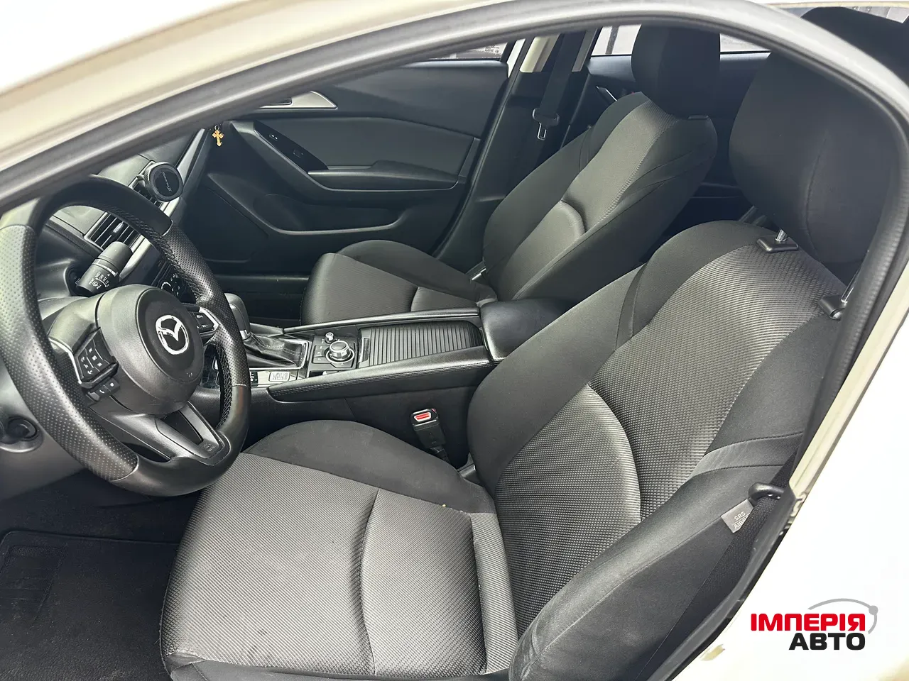 Mazda 3 - фото 9