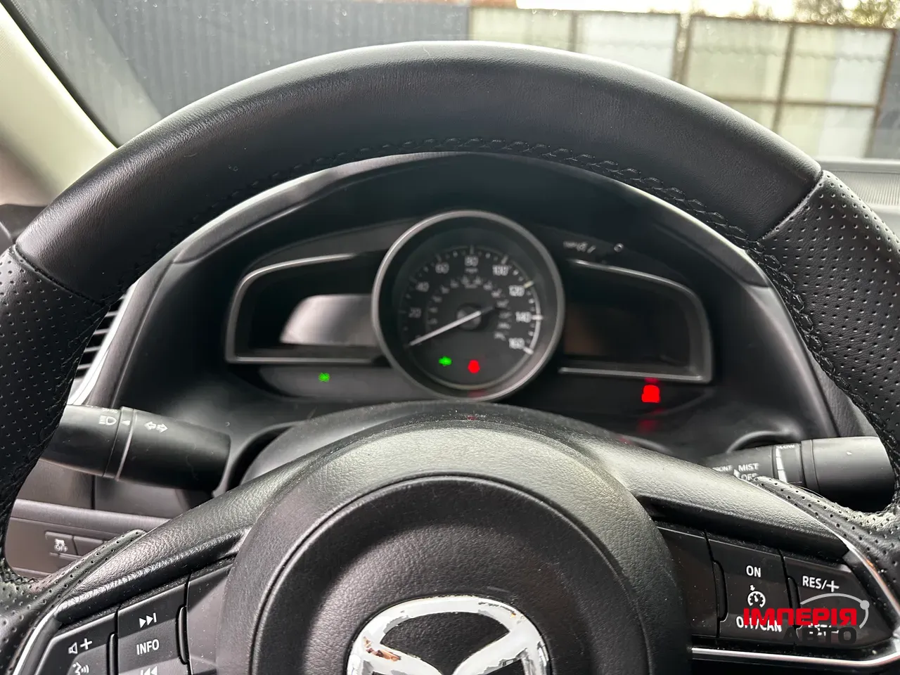 Mazda 3 - фото 12