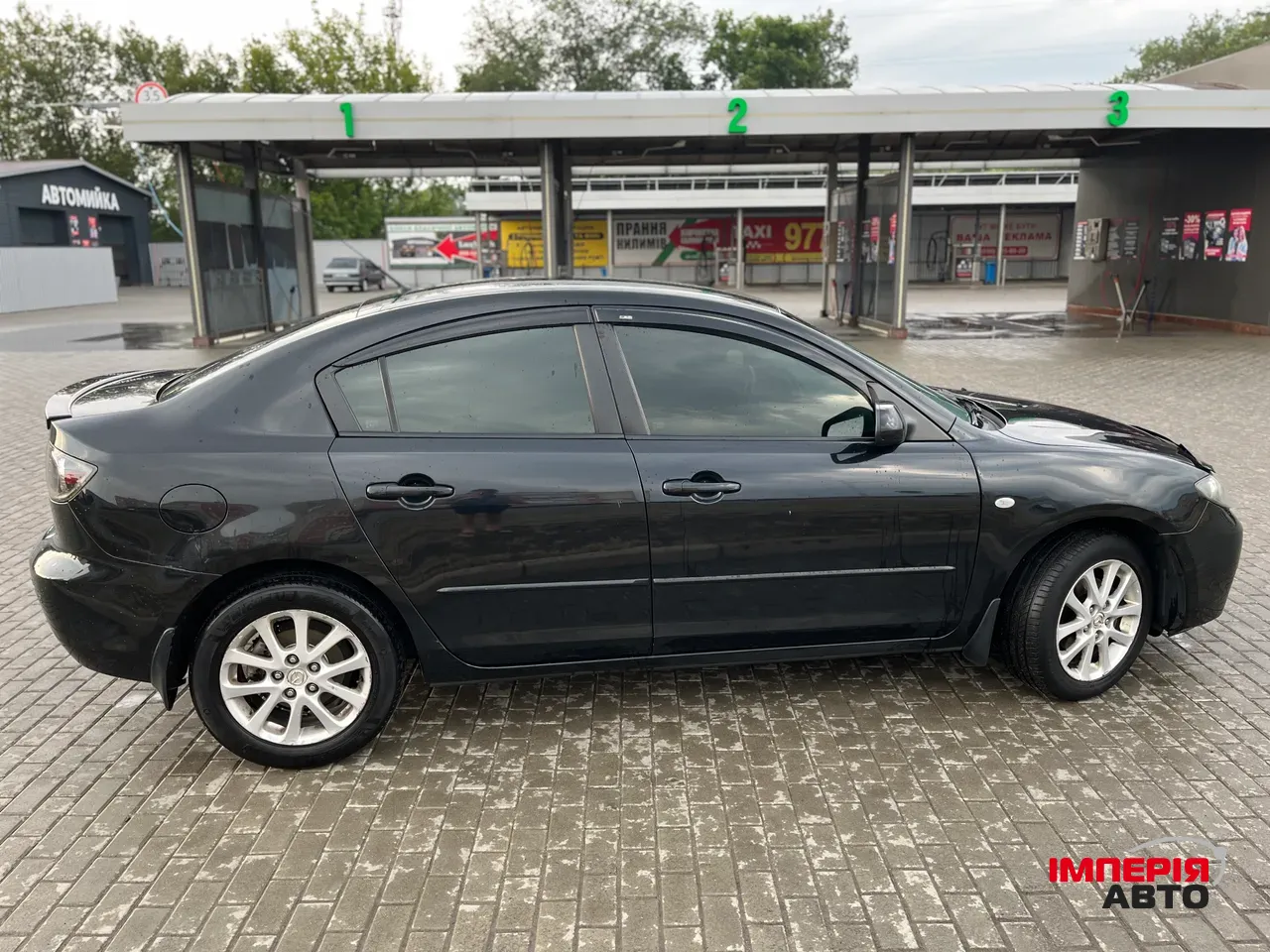 Mazda 3 - фото 7