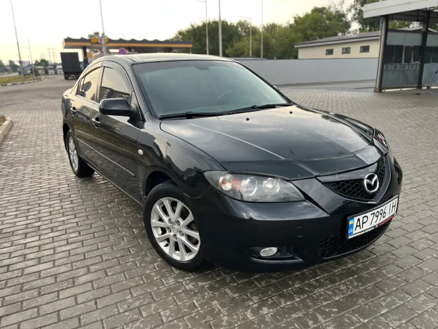 Mazda 3 - фото 3