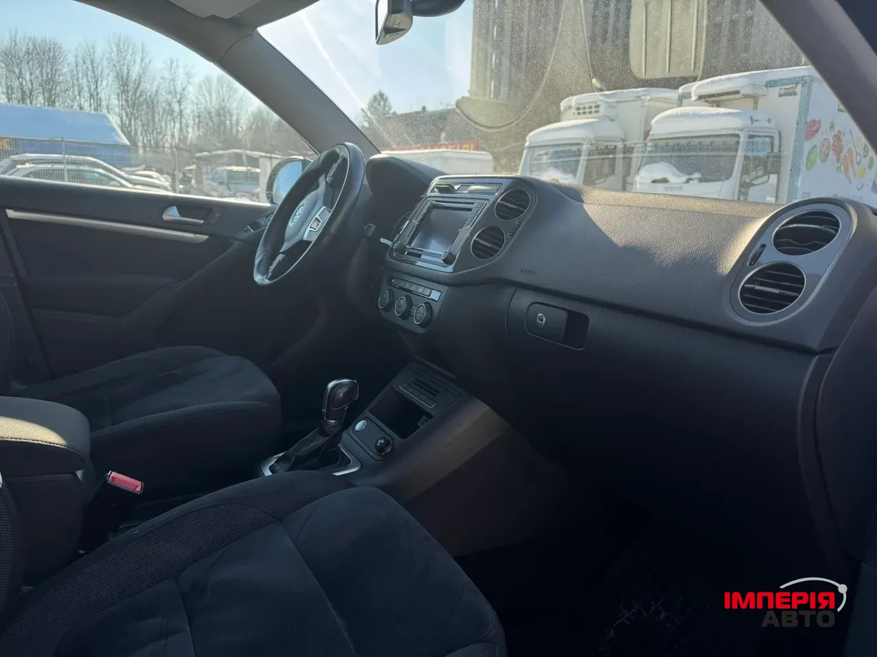 Volkswagen Tiguan - фото 11