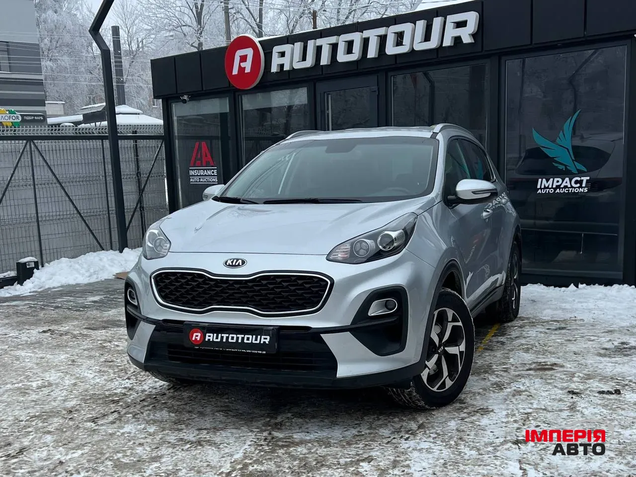 Kia Sportage - фото 1