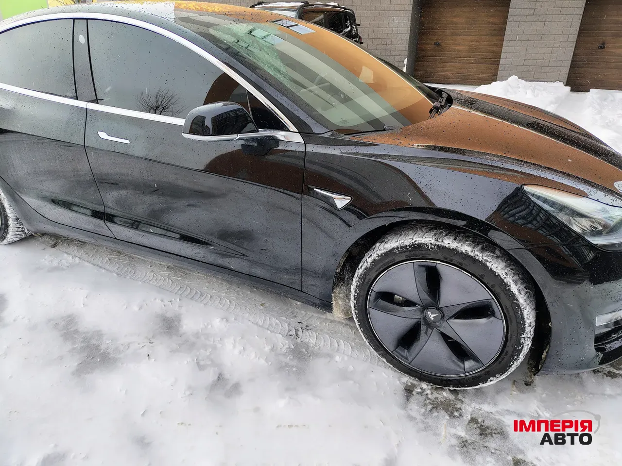 Tesla Model 3 - фото 8