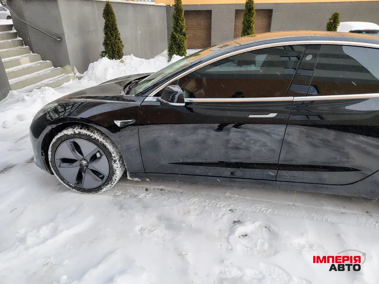 Tesla Model 3 - фото 11