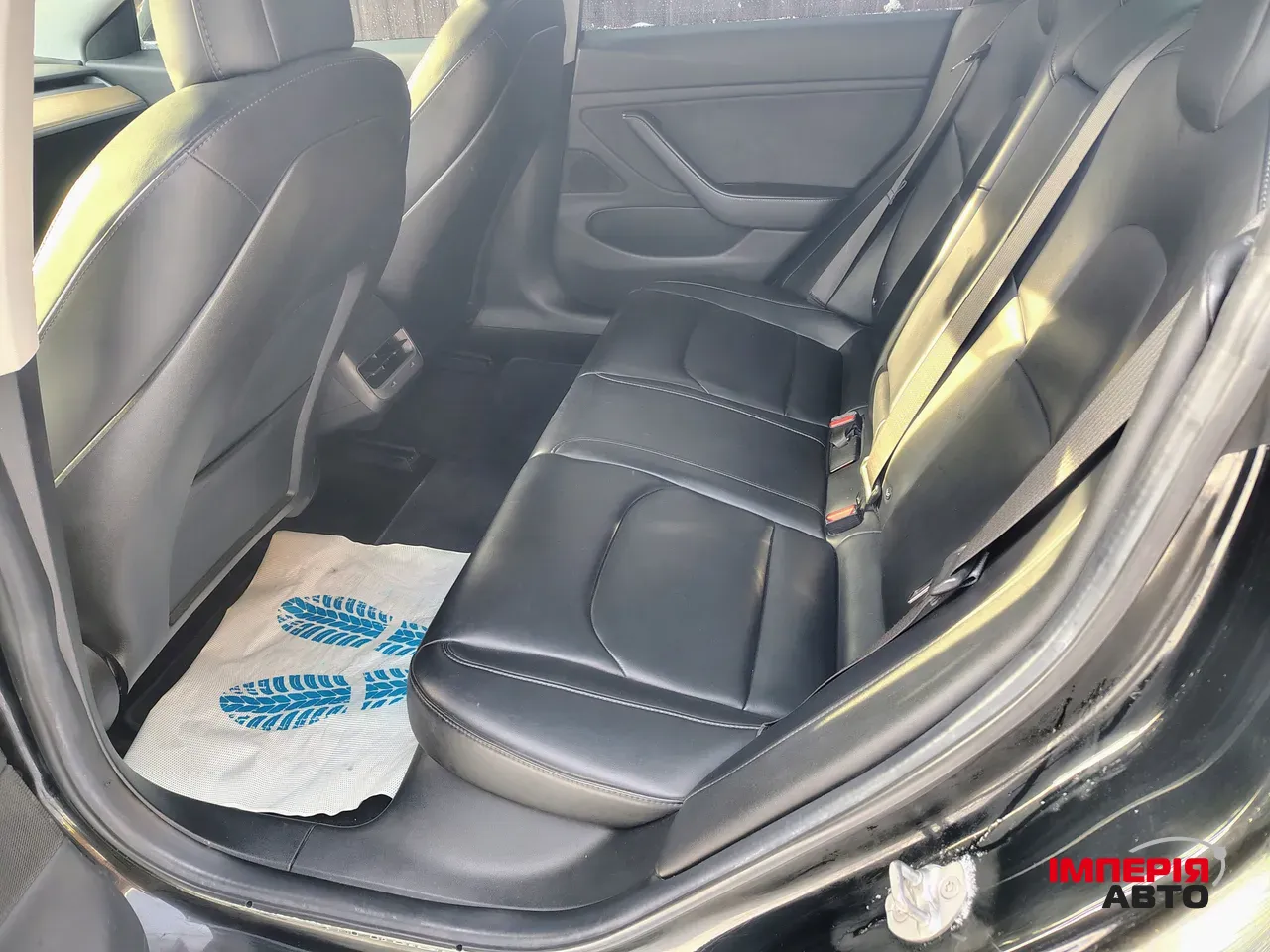 Tesla Model 3 - фото 28