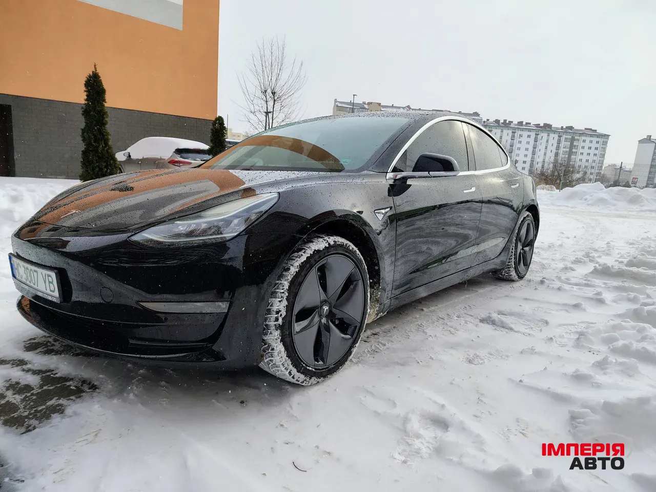 Tesla Model 3 - фото 12