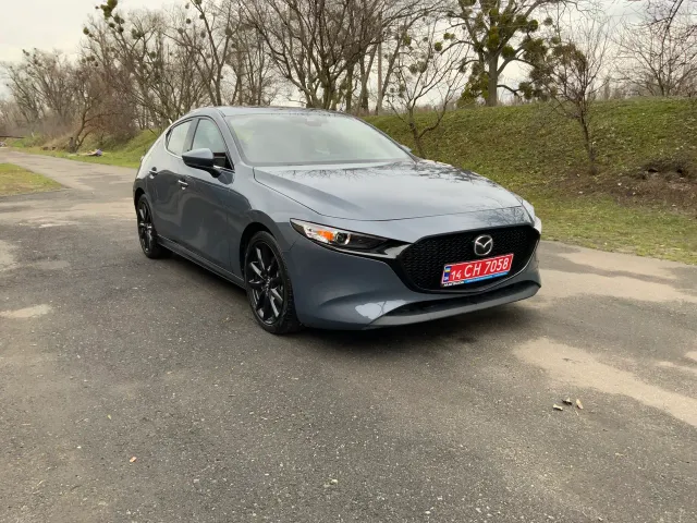 Mazda 3 - фото 2
