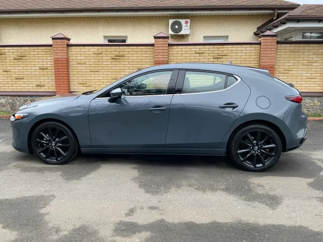 Mazda 3 - фото 4
