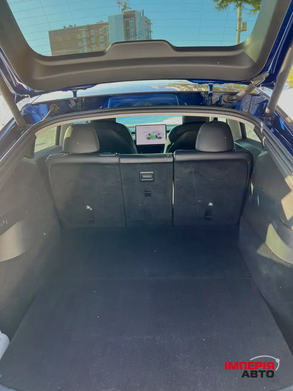 Tesla Model Y - фото 16