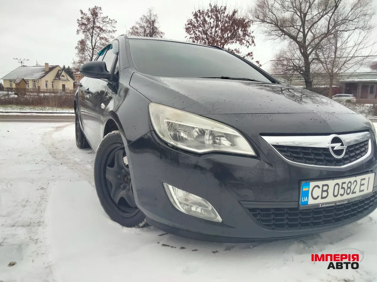 Opel Astra - фото 12