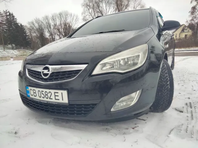 Opel Astra - фото 1