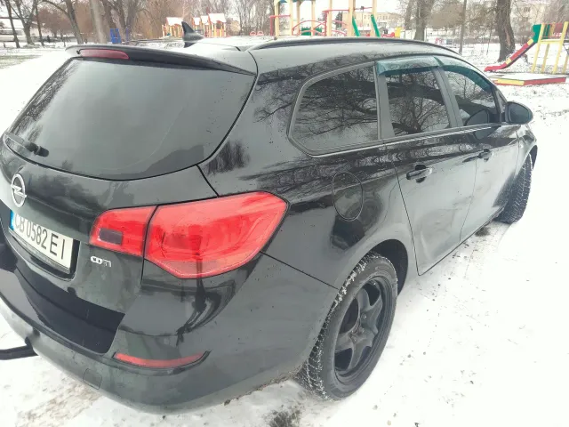 Opel Astra - фото 4