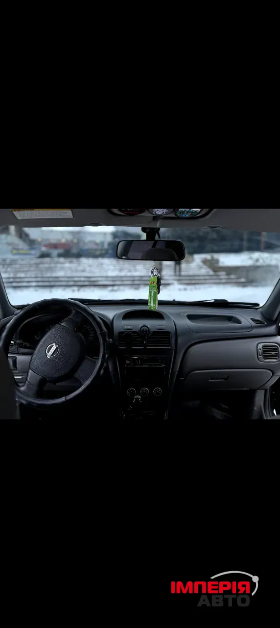 Nissan Almera Classic - фото 11