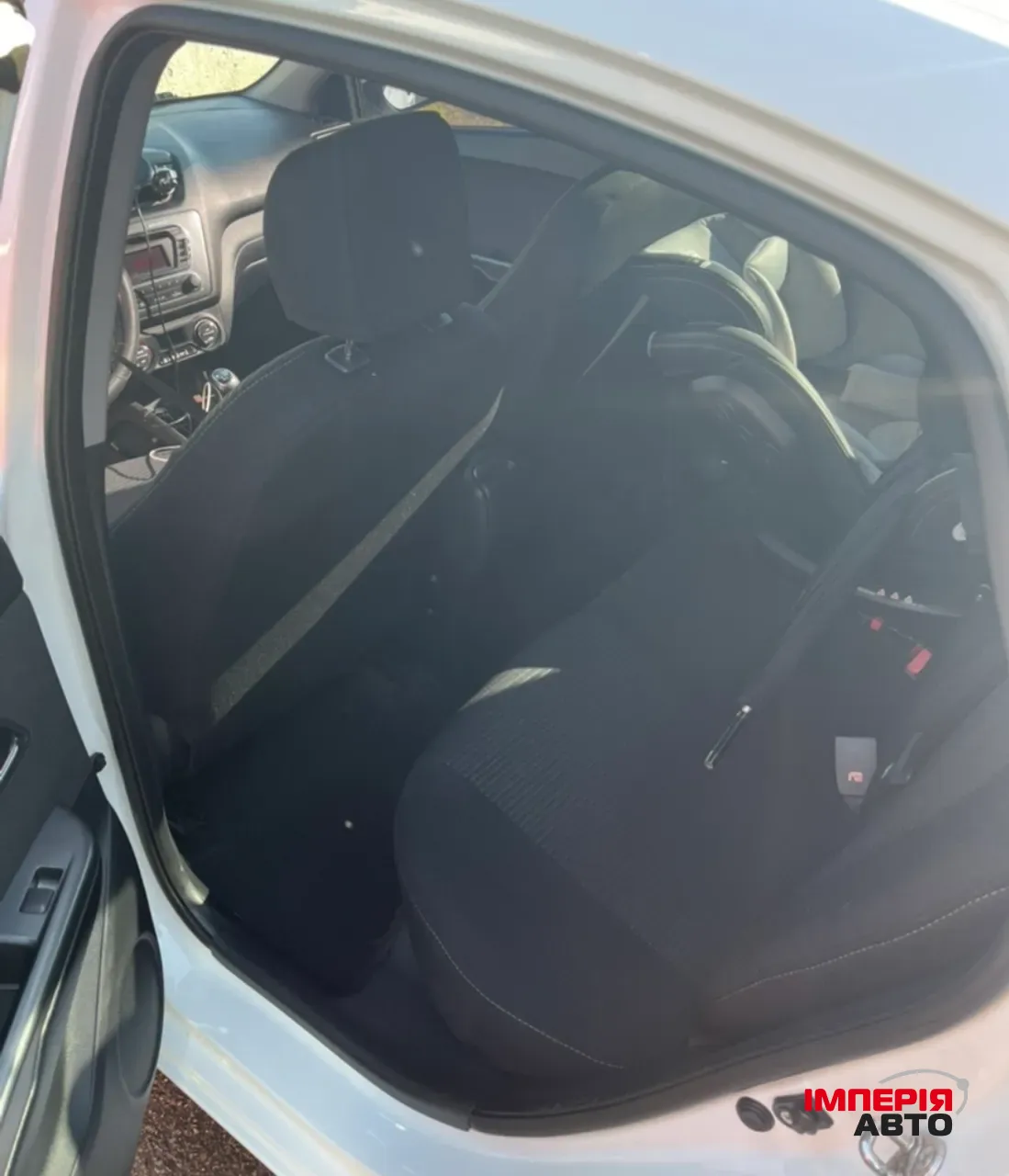 Kia Rio - фото 9